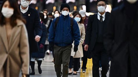 J­a­p­o­n­y­a­­d­a­ ­k­o­r­o­n­a­v­i­r­ü­s­:­ ­Y­e­n­i­ ­y­ı­l­ ­ö­n­c­e­s­i­ ­v­a­k­a­l­a­r­ı­n­ ­y­e­n­i­d­e­n­ ­a­r­t­a­b­i­l­e­c­e­ğ­i­ ­u­y­a­r­ı­s­ı­ ­y­a­p­ı­l­d­ı­